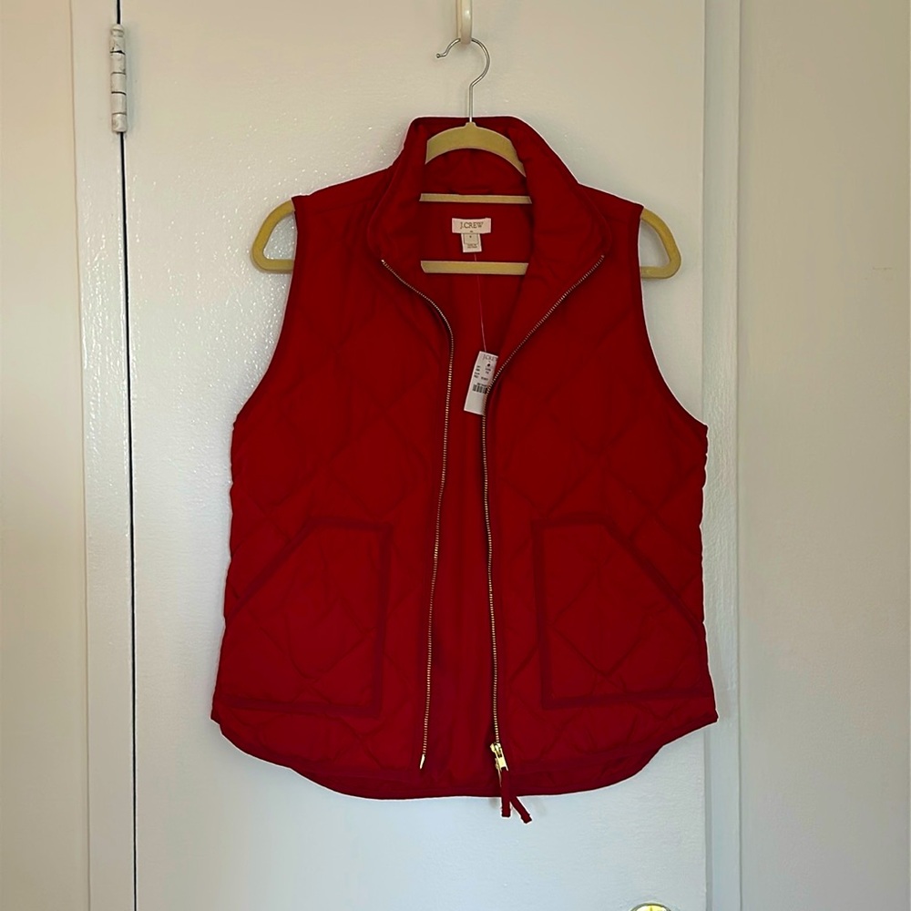 Red puffer vest. Jcrew. Never worn with tags. Size small.
